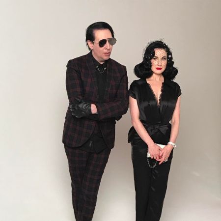 Marlyn Manson and model Dita Von Teese during a photoshoot while they were married.